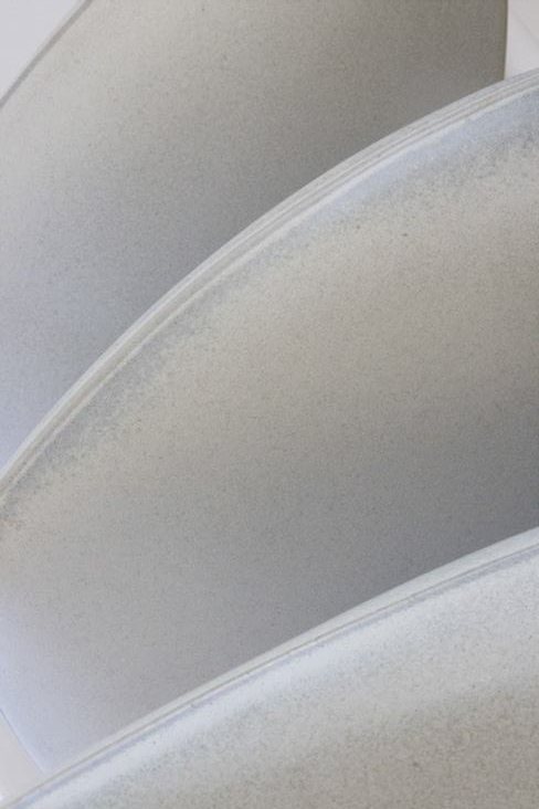 Close-up of the ridge running along each vase