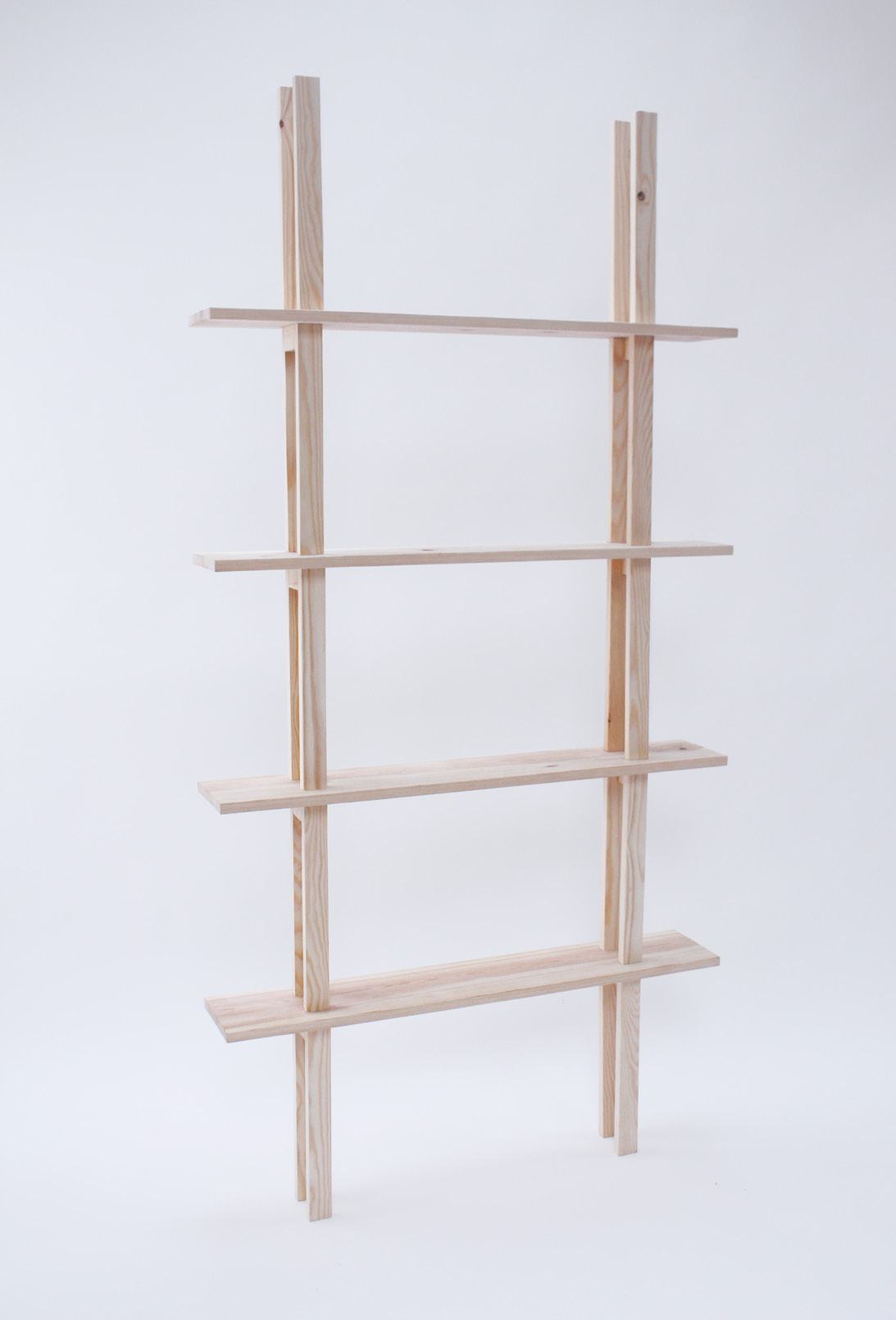 Tall pine shelving unit with four shelves on paired battens