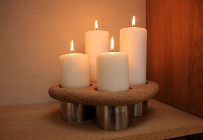 Quad holder lit in a warm corner