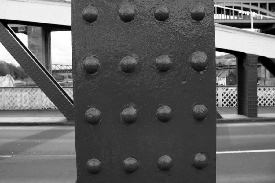 Close-up of rivets on a painted girder of the Tyne Swing Bridge