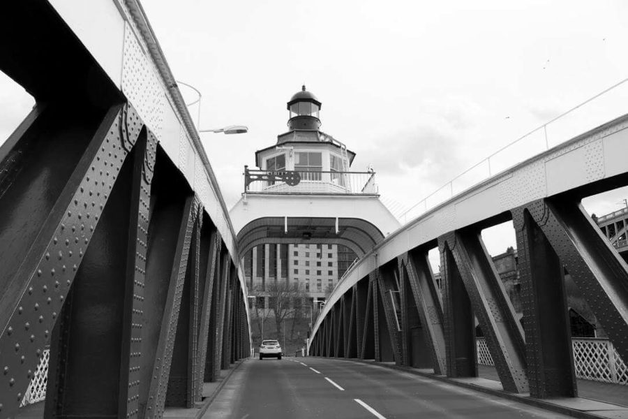 Looking along the Tyne Swing Bridge between its riveted red girders