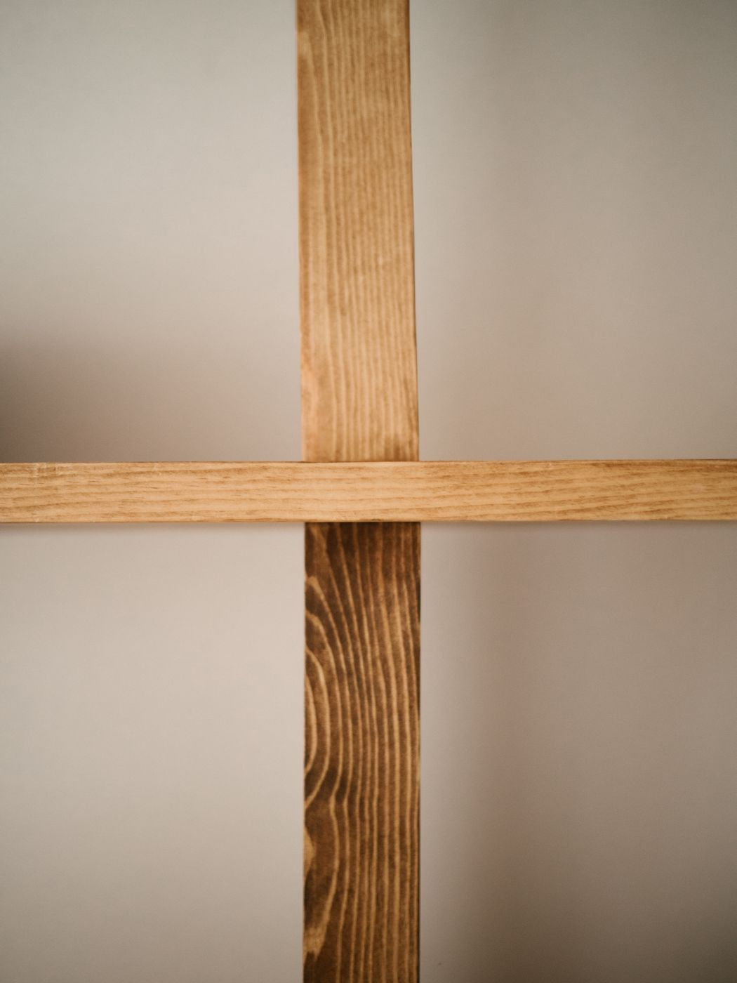 A shelf crossing an upright post, showing the joint